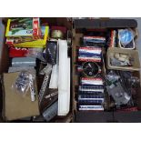 Two boxes containing a quantity of model railway items comprising, N gauge scenics, OO gauge track,