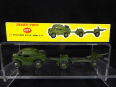 Dinky Toys - A boxed Dinky Toys # 697 25 - Pounder Field Gun Set.