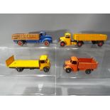 Dinky - Four unboxed diecast model vehicles by Dinky to include # 531, # 410, # 406 and similar.