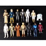 Star Wars - A collection of loose vintage Star Wars figures to include Stormtroopers, Ben Kenobi,