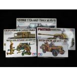 Tamiya - Five boxed 1:35 scale model kits of military vehicles and figures by Tamiya.