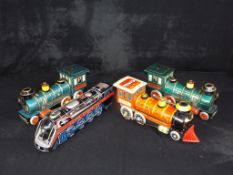 Modern Toys and other - 4 unboxed Vintage Japanese and Chinese Tinplate Toy Trains.