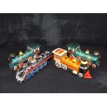 Modern Toys and other - 4 unboxed Vintage Japanese and Chinese Tinplate Toy Trains.