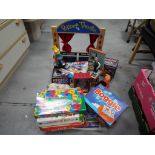 Toys and Games - a good mixed lot of toys and games to include wooden puppet theatre with three