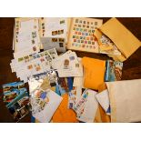 A large accumulation of British and foreign stamps together with a few bank notes,