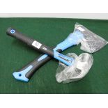 A new claw hammer and a new axe with fibre glass handle