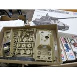 A quantity of boxed model motorcycles, tanks,