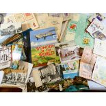 A small collection of British and foreign postcards together with seven albums of cigarette cards