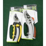 A pair of new pruners and secateurs