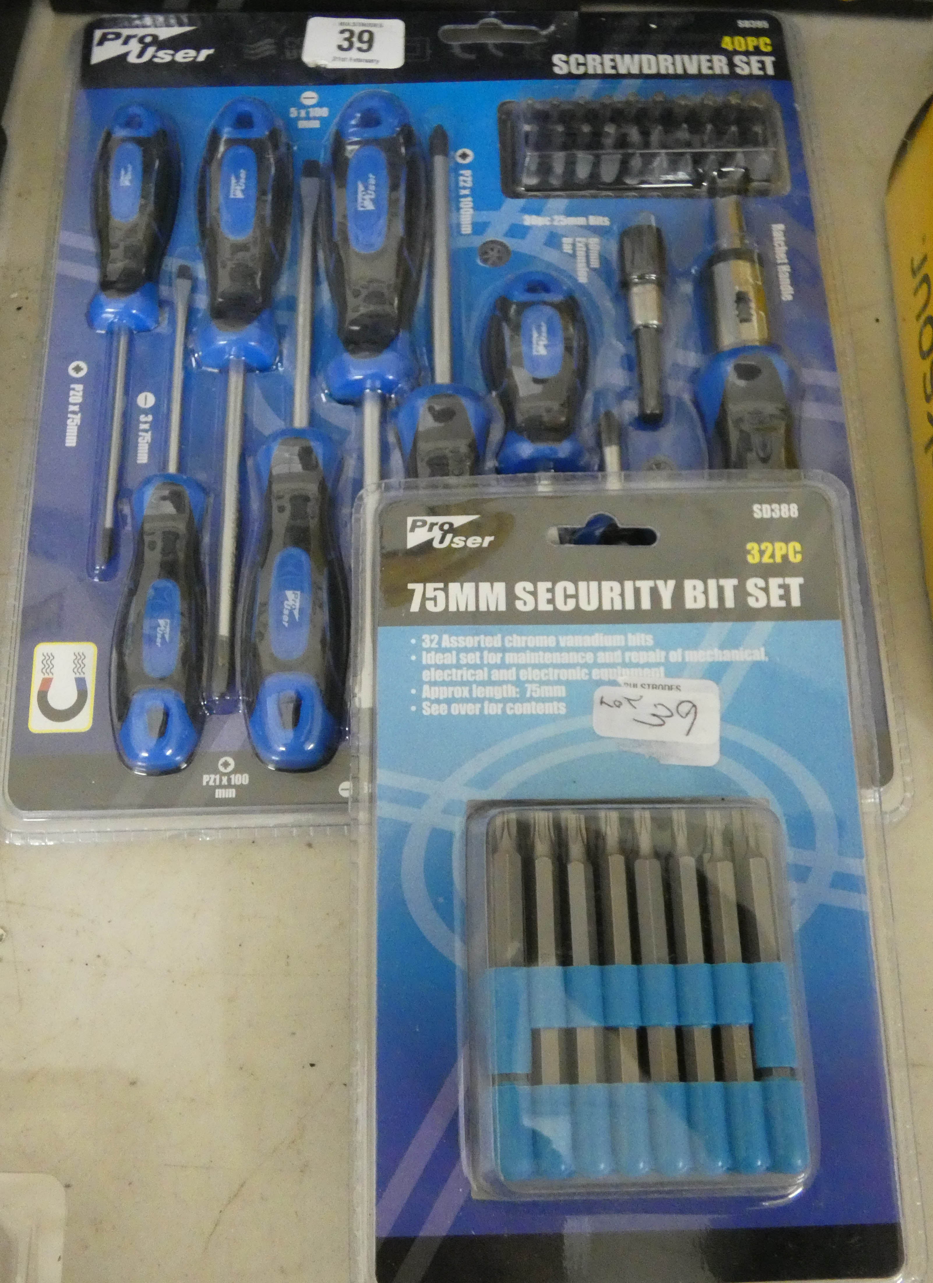 A new 40 piece screw driver set and a new 32 piece 75mm security bit set