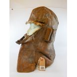 A full face and neck leather flying helmet complete with original straps and interior with War