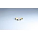 18ct and platinum mounted solitaire diamond ring, ring size K It weighs 2g.