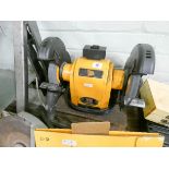 A JCB double ended bench grinder