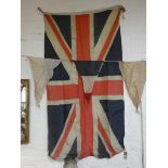 A quantity of old assorted flags and bunting