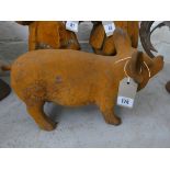 A rust cast iron pig