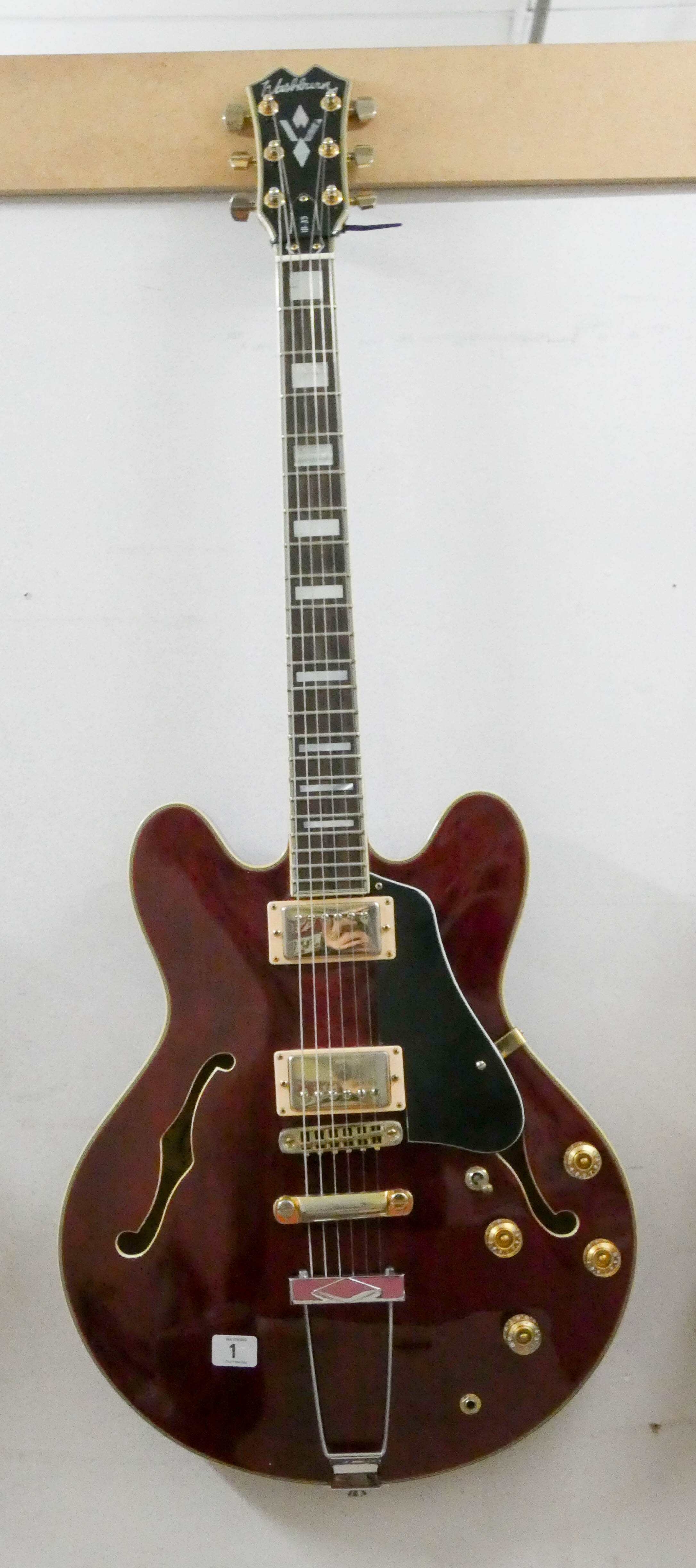 A George Washburn electric guitar Model No. BH35 and Serial No.