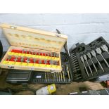 A comprehensive drill bit set and a screw fix router fit set in wooden carrying case