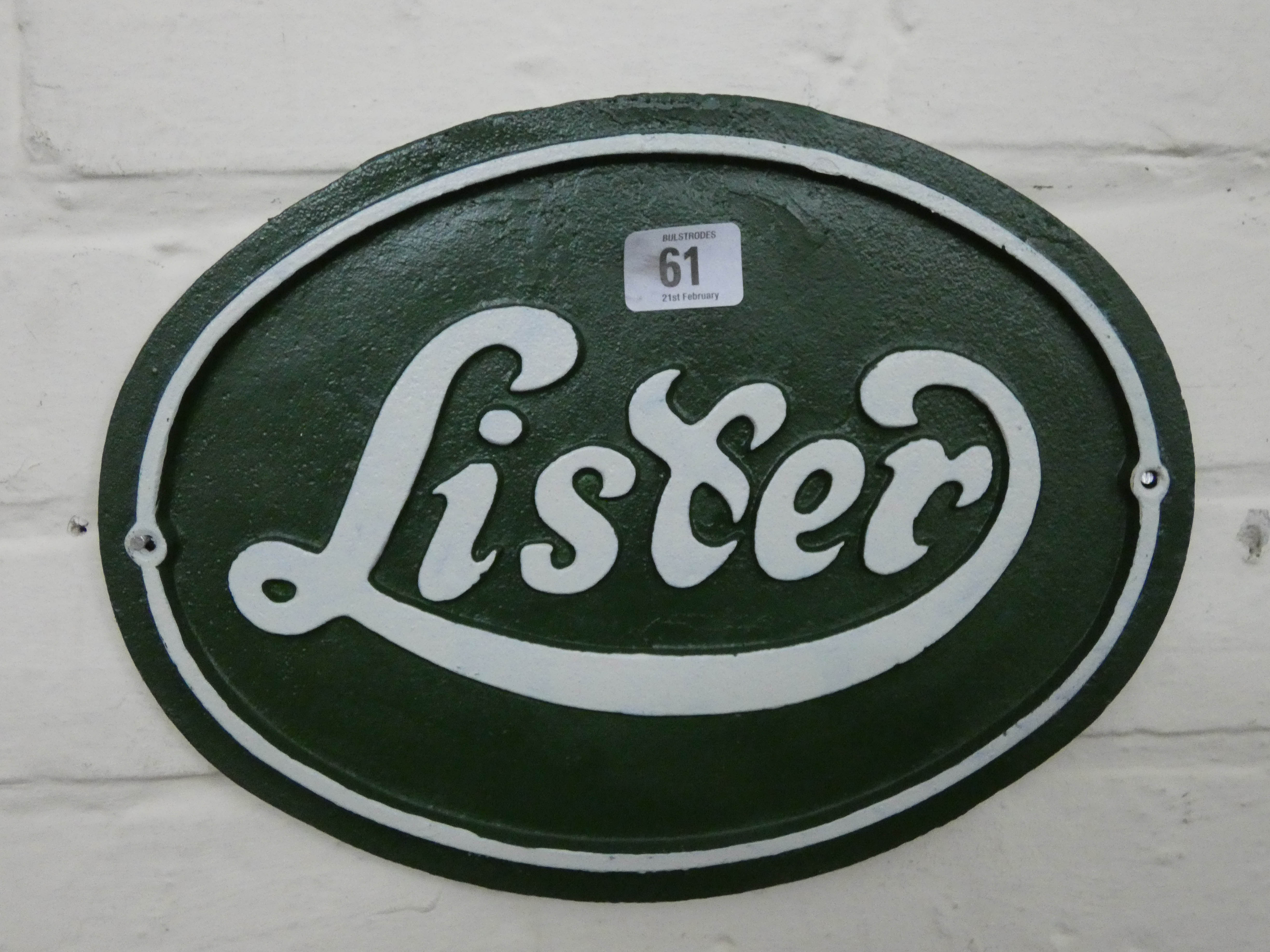 A Lister cast iron sign