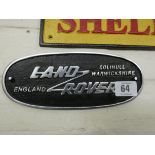 A Land Rover cast iron wall hanging sign