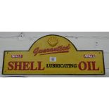A curved cast iron Shell Oil sign