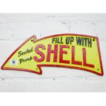 A large arrow shaped Shell cast iron wall plaque