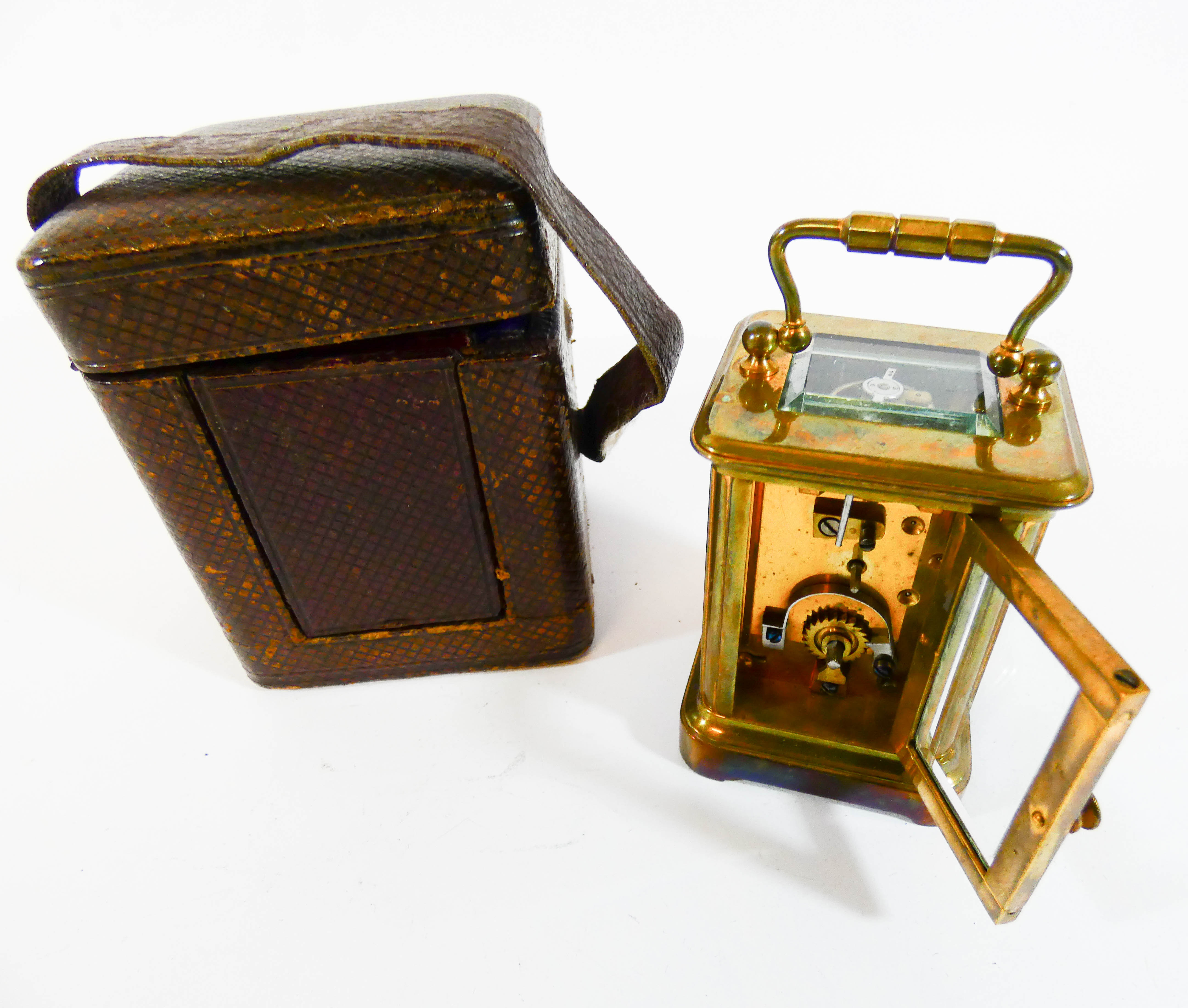 A miniature gilt brass carriage clock with leather travelling case, height with the handle up 9. - Image 2 of 3