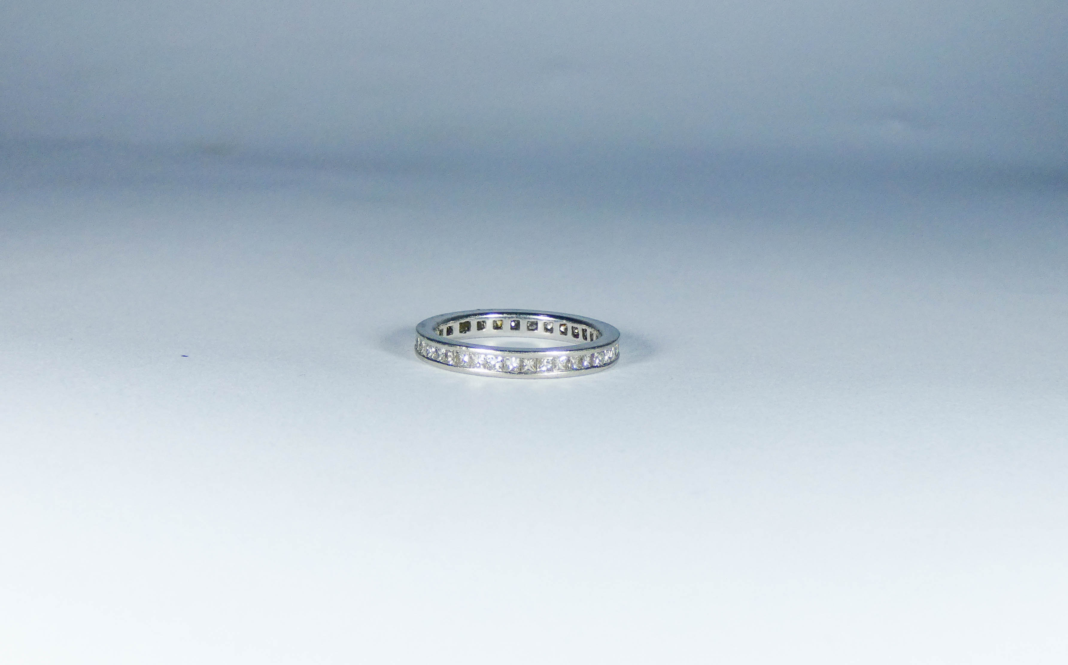 Platinum full diamond eternity ring, channel set with brilliant cut diamonds, - Image 2 of 2
