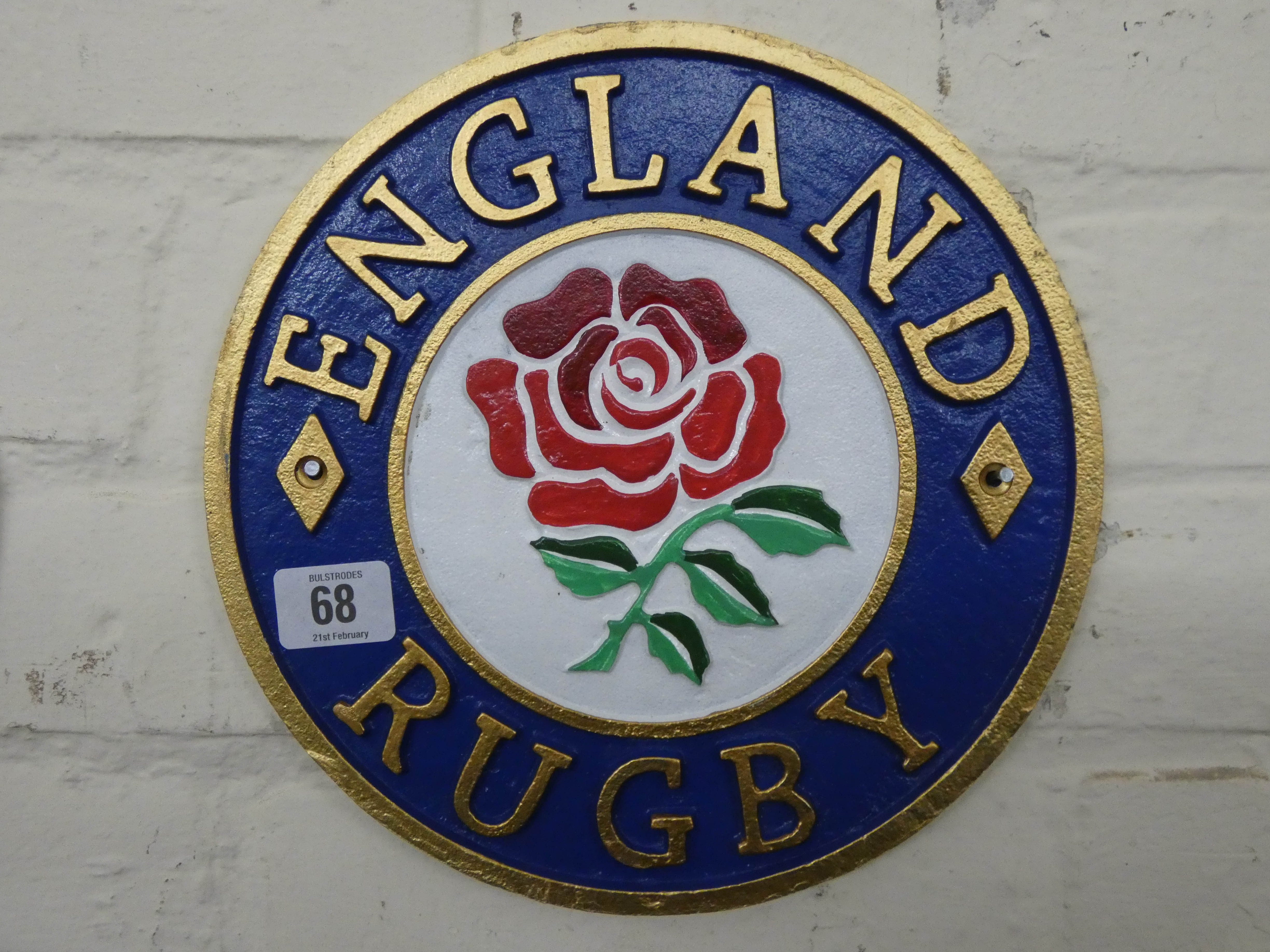 A cast iron England rugby wall hanging plaque