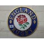 A cast iron England rugby wall hanging plaque