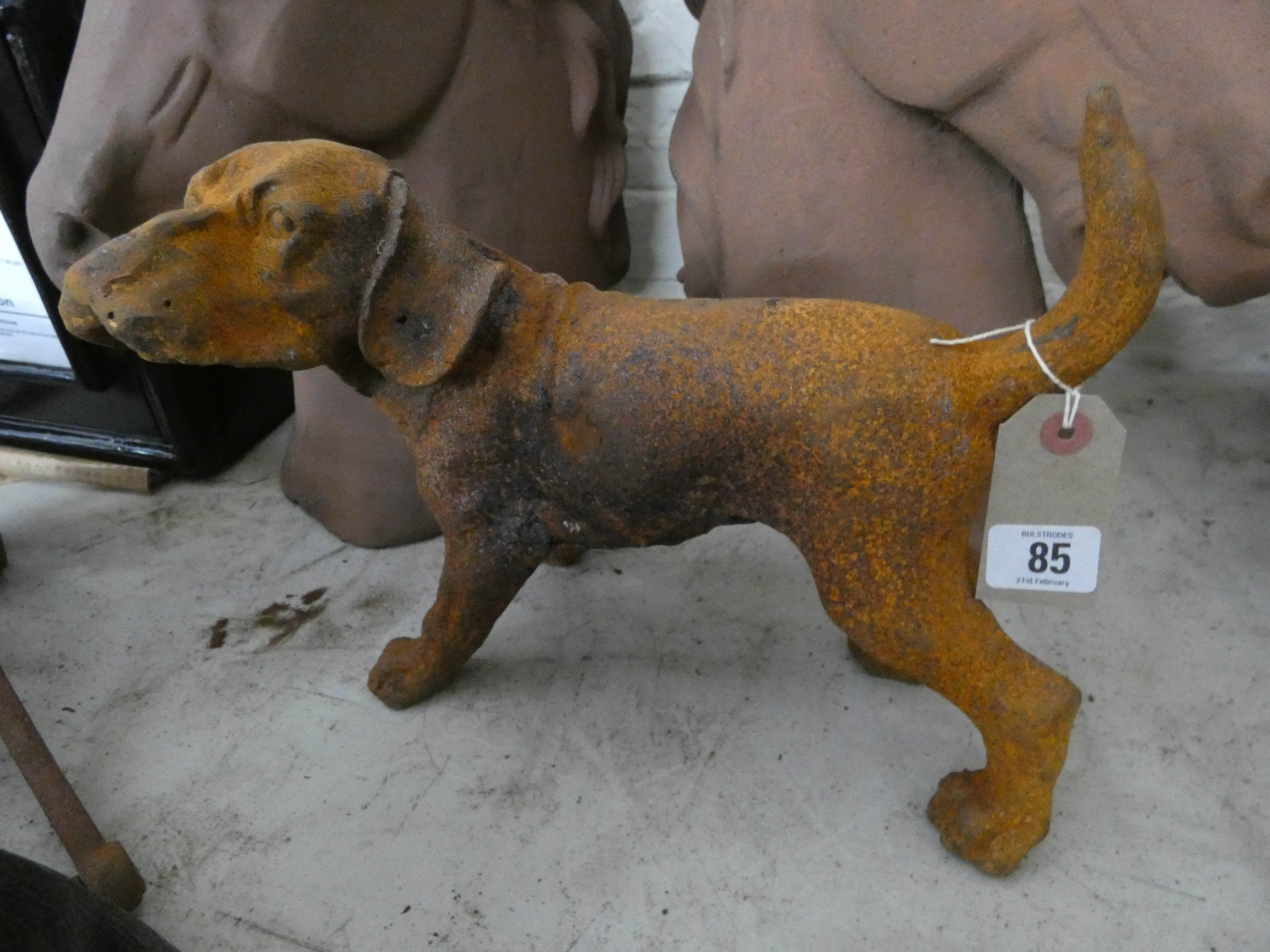 A large cast iron puppy ornament