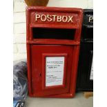 A red reproduction wall hanging post box