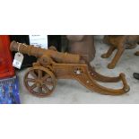 A small rusty cast iron cannon