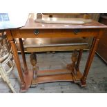 A mahogany hall table and an oak coffee table