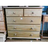 A pine chest of three long and two short drawers 2'6 wide
