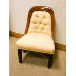 A pair of Victorian mahogany framed occasional chairs with yellow buttoned back and upholstered