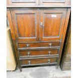 A 1930's oak millinery cabinet with three long drawers under 3' wide (badly wormed)