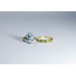 A 9ct gold blue topaz dress ring and an 18ct gold emerald and diamond half hoop ring size S and O