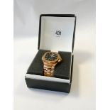 A rose gold coloured gent's wristwatch in a box