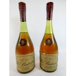 Two bottles of Balvenie Founders Reserve Scotch whisky in cognac shaped bottles.