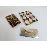 Two Victorian card cases in tortoiseshell and a hallmarked silver envelope style card case