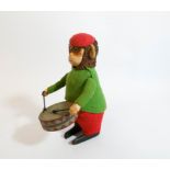 A Schuco patent drumming monkey clockwork toy