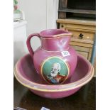 A hand painted Denby toilet jug and bowl