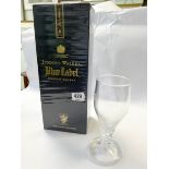 An unopened Johnny Walker Blue Label Scotch Whisky in a box together with an air twisted stem wine