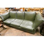 A three seater Knoll settee in dark green leather