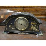 A mantel clock in blue lacquered chinoisserie case