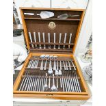 A canteen of Viners cutlery in oak case together with a plated tray, candelabra,