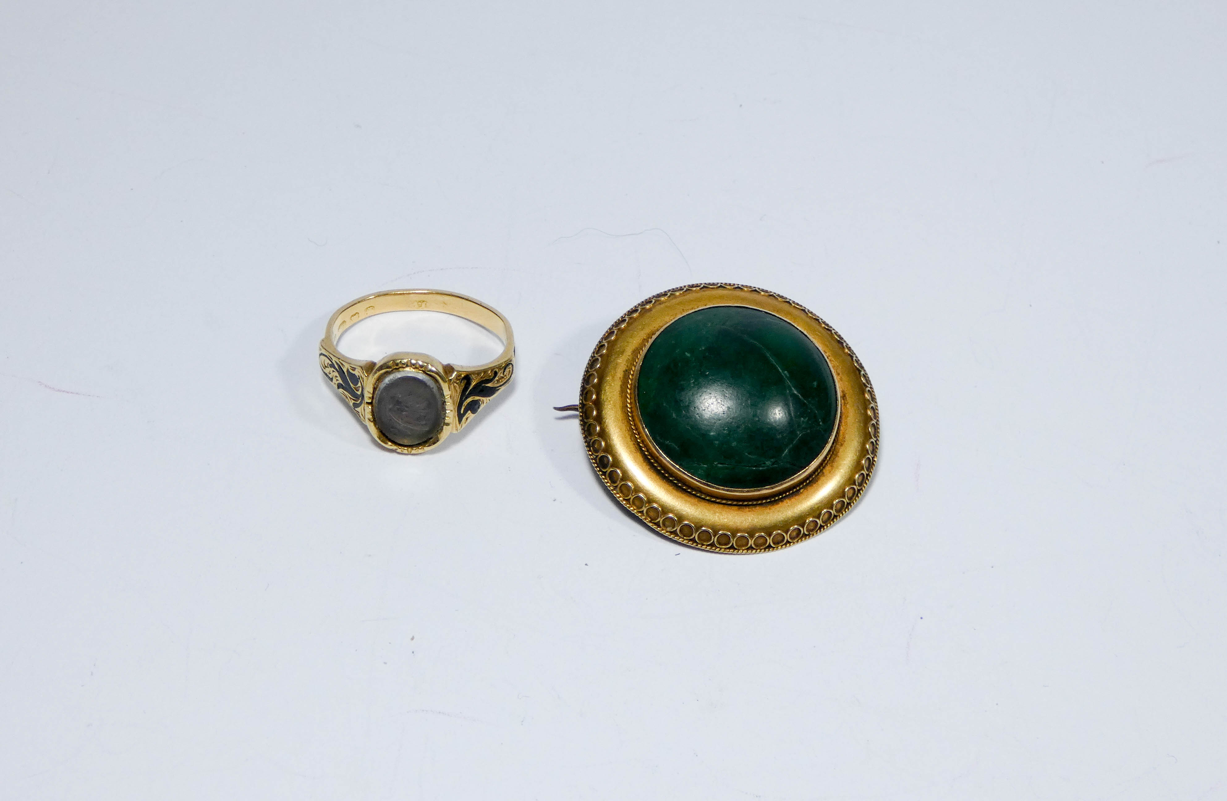 19th century 18ct gold memorial ring with black enamel decoration with inscription dated 1854 and a