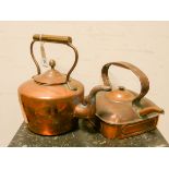 A Victorian copper kettle and a square copper kettle
