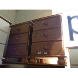 A pair of modern pine three drawer bedside chests