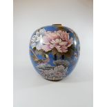 A very large cloisonne ginger jar and cover decorated with exotic birds amidst peony flowers on a